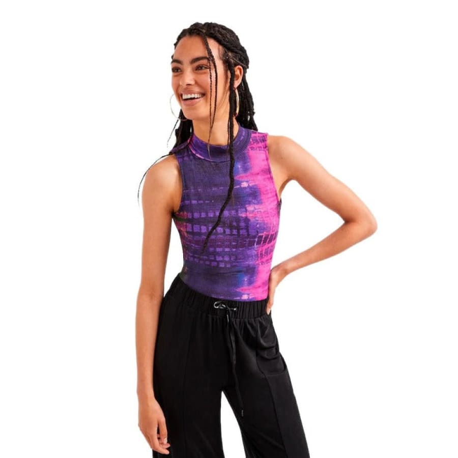 Woman in purple tank top from Urban City Styles