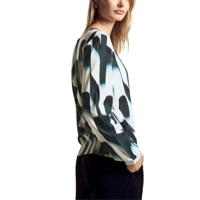 Abstract patterned long-sleeved top worn by a woman from Street One Women Shirt collection