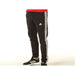 Adidas Men Trousers featuring track pants with three white stripes and a red waistband