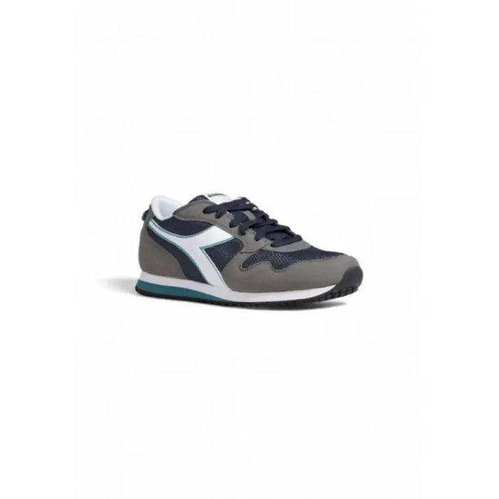 Athletic sneaker featuring gray, navy, and white with teal accents by Diadora