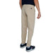 Beige chino pants with Tommy Hilfiger logo on back pocket, from Tommy Hilfiger Jeans