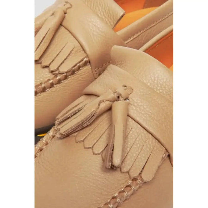 Beige leather loafers with tassels and fringe from Dr. Martens Women Moccassin collection