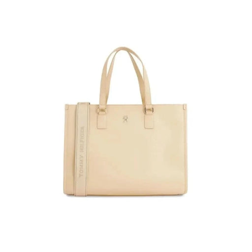 Beige leather tote bag with structured shape and double handles by Tommy Hilfiger