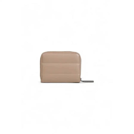 Beige leather Calvin Klein women’s wallet with zipper closure displayed stylishly