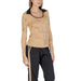 Beige long-sleeved top with black collar and matching side-striped track pants