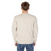 Beige long-sleeved sweater worn by a person, Calvin Klein Jeans Men Sweatshirts