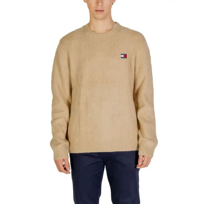 Beige Tommy Hilfiger knit sweater featuring logo patch in men’s knitwear collection