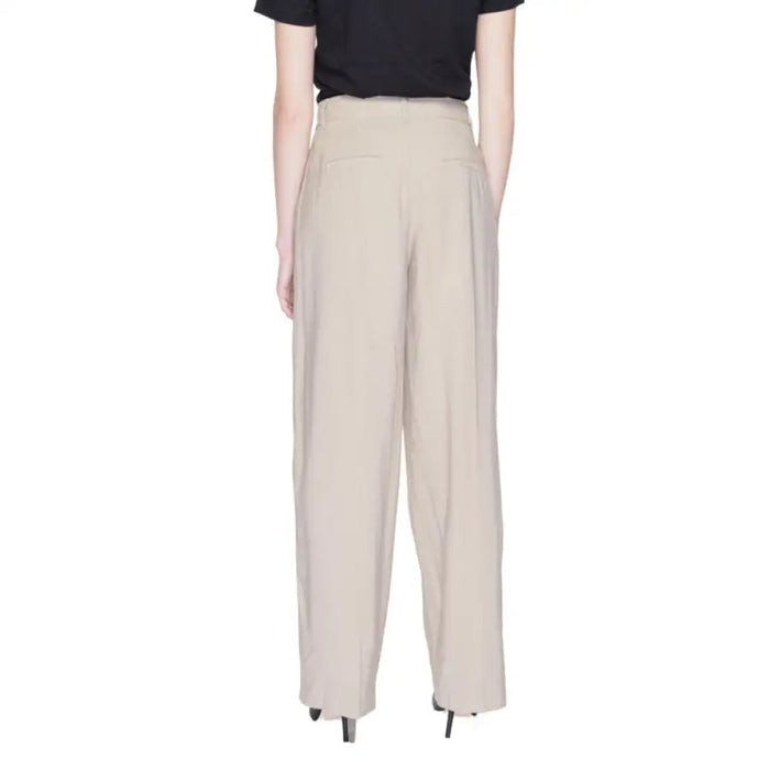 Beige wide-leg trousers by Only featuring a stylish palazzo design for women