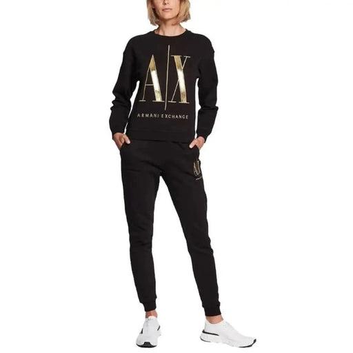 Black Armani Exchange tracksuit with gold logo on sweatshirt for women