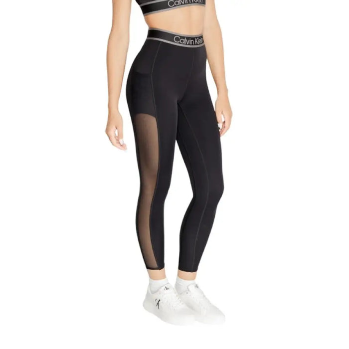 Black Calvin Klein Sport Women’s leggings featuring sheer mesh side panels