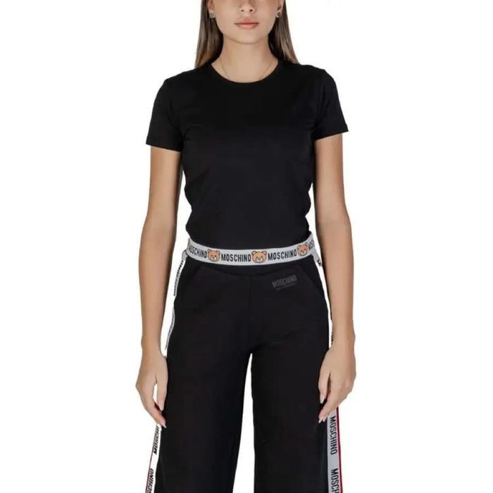 Black athletic outfit with cropped t-shirt and wide-leg pants by Moschino Underwear