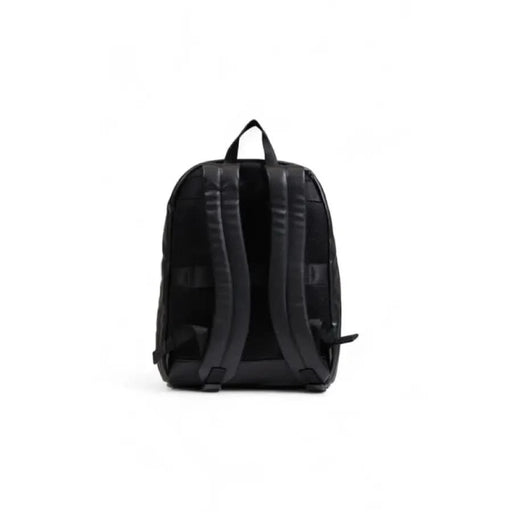 Black Tommy Hilfiger men’s backpack featuring padded shoulder straps and a minimalist design