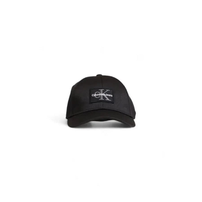 Black baseball cap featuring a monochrome CK logo from Calvin Klein Jeans