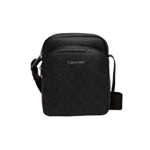 Black Calvin Klein crossbody bag featuring monogram pattern, ideal for men’s fashion