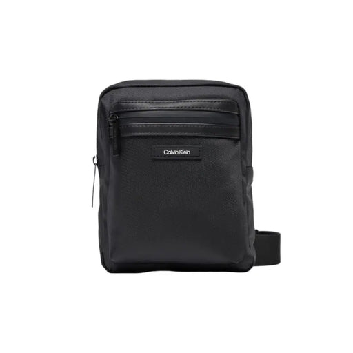 Black Calvin Klein shoulder bag for men featuring multiple zippered compartments