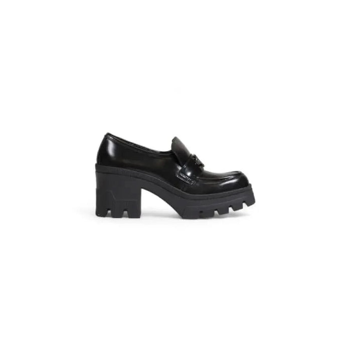 Black chunky platform loafer with thick heel and treaded sole by Calvin Klein Women