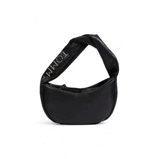 Black crescent-shaped Tommy Hilfiger handbag with a wide strap for women