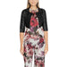 Black cropped bolero jacket elegantly paired with a floral print outfit by Rinascimento