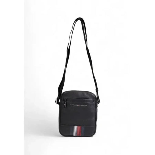 Black crossbody bag featuring striped logo detail from Tommy Hilfiger Men Bag collection