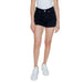 Vero Moda black denim shorts paired with a white top and sneakers for a stylish look