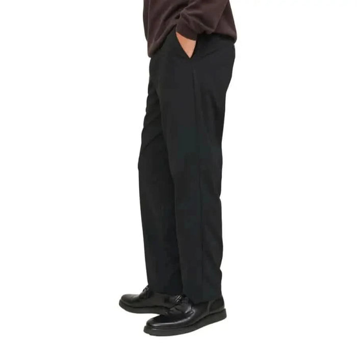 Black dress pants from Jack & Jones featuring hands in pockets for a polished look