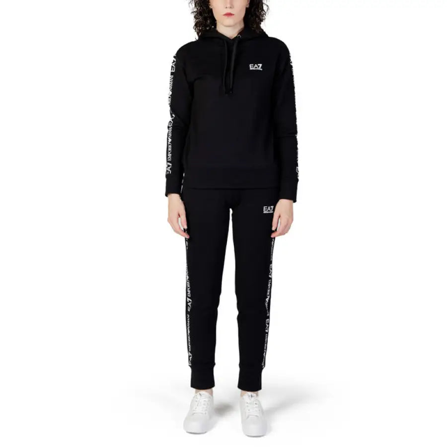 Black EA7 branded tracksuit with white sneakers from the EA7 Women Jumpsuit collection