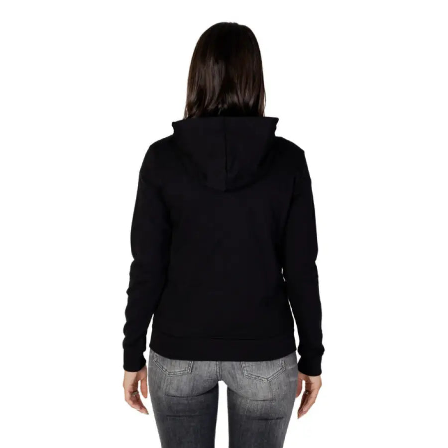 
                      
                        Armani Exchange Women Sweatshirt in black, modeled from behind with long dark hair
                      
                    