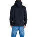 Black hooded sweatshirt and blue jeans by Calvin Klein Jeans, back view