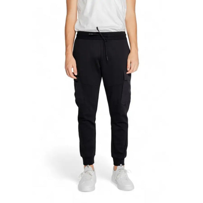 Black jogger-style sweatpants with elastic cuffs from Antony Morato Men Trousers collection