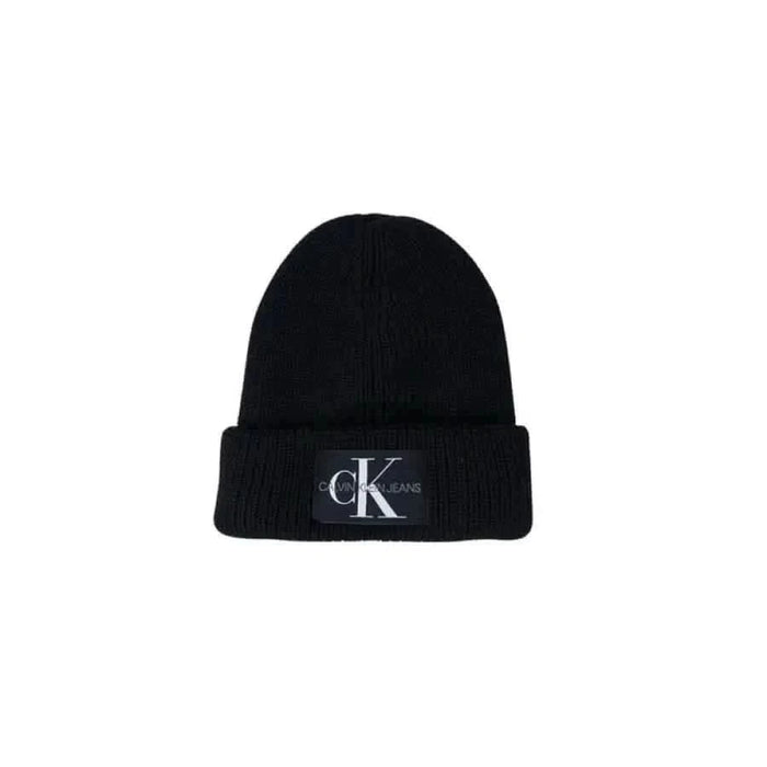 Black knit beanie featuring CK logo patch from Calvin Klein Jeans Women’s Cap collection