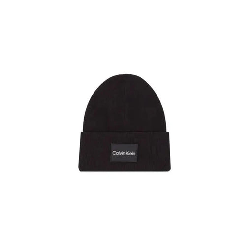 Black knit beanie featuring a Calvin Klein logo patch for men’s fashion accessories