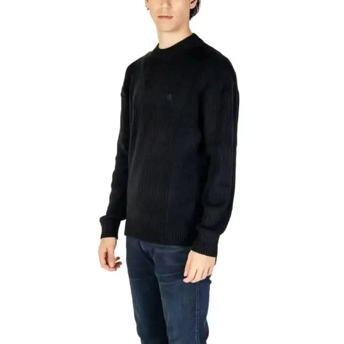 Black knit crewneck sweater from Calvin Klein Jeans men’s knitwear collection