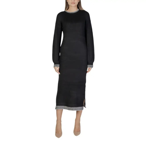 Black knit midi dress by Vila Clothes featuring contrasting ribbed trim at neck and hem