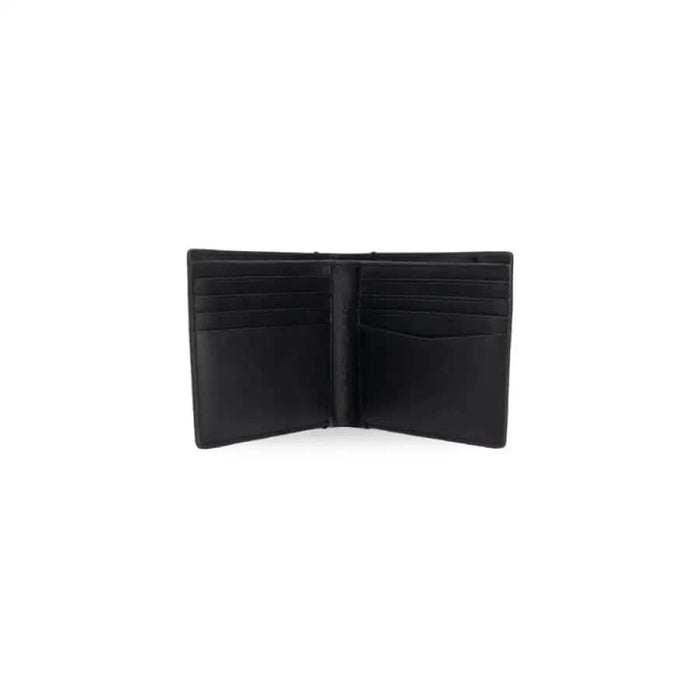 Black leather bifold wallet by Calvin Klein showcasing card slots and stylish design