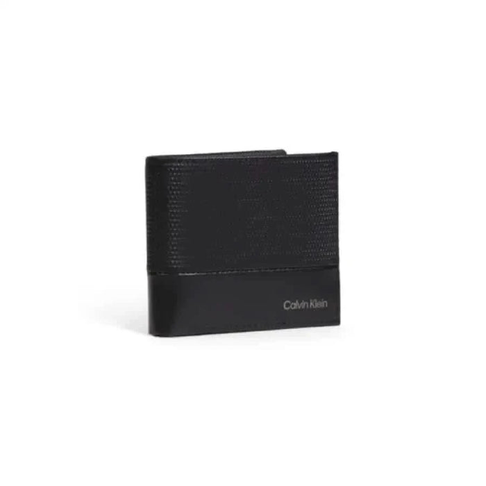 Black leather Calvin Klein wallet with textured design, stylish accessory for men