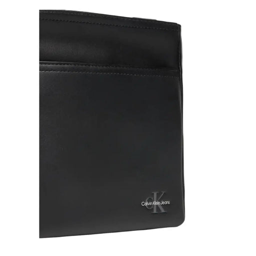 Black leather Calvin Klein wallet with subtle logo in Calvin Klein Men’s Shopper Bag