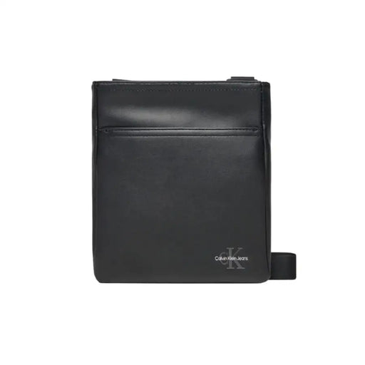 Black leather Calvin Klein crossbody bag featuring a front pocket for stylish convenience