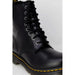 Dr. Martens Women Boots: Black Leather Combat Boot with Yellow Stitching and Lace-Up Design