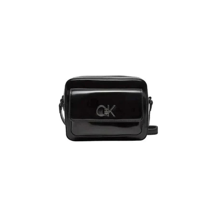 Black leather crossbody bag with CK logo on front flap by Calvin Klein Women Bag