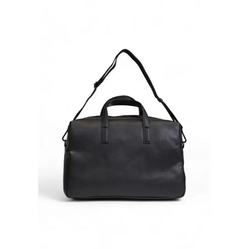 Black leather duffle bag with handles and shoulder strap by Calvin Klein