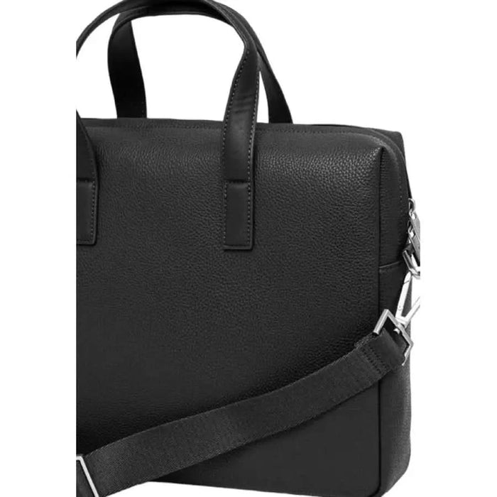 Black leather handbag with handles and detachable shoulder strap by Calvin Klein