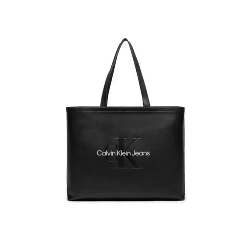 Black leather tote bag featuring Calvin Klein Jeans branding in Calvin Klein Women Bag