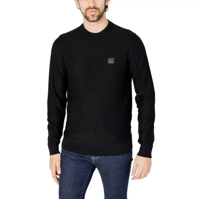 Black long-sleeved crewneck sweater with logo patch from Boss Men Knitwear collection