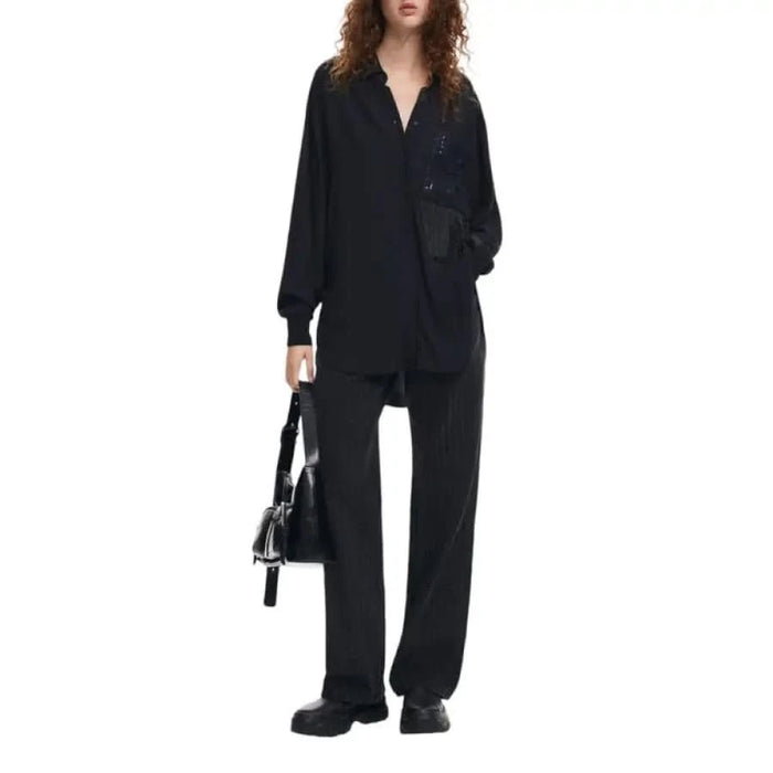 Black long-sleeved jumpsuit with wide-leg pants and v-neckline from Desigual Women Jeans