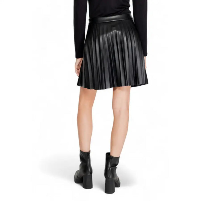 Black pleated leather skirt with ankle boots from Morgan De Toi Women Skirt collection