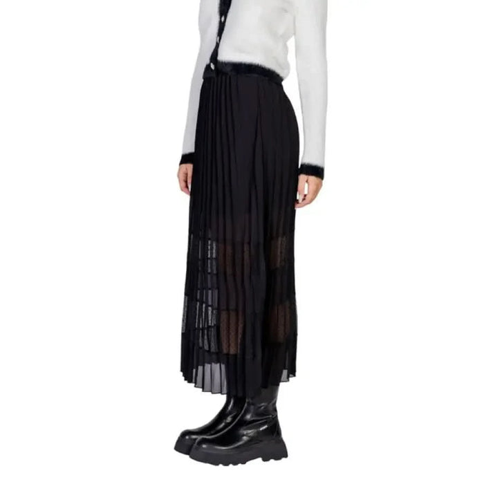 Black pleated sheer maxi skirt with chunky boots by Morgan De Toi for women