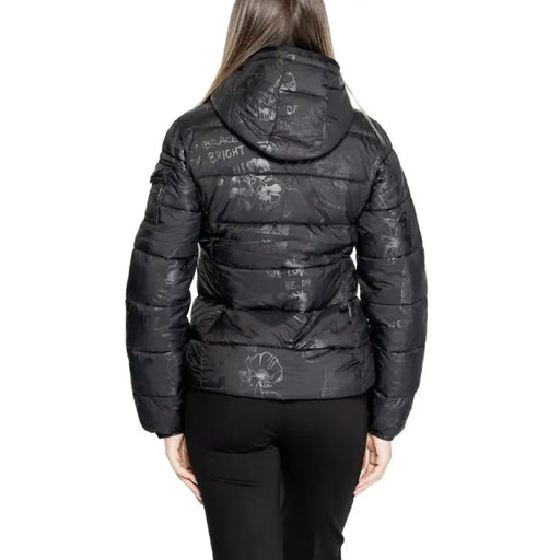 Black hooded puffer jacket displayed from the back by Desigual for women