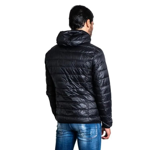 Black puffer jacket worn by a person from behind for Ea7 Men Jacket product display