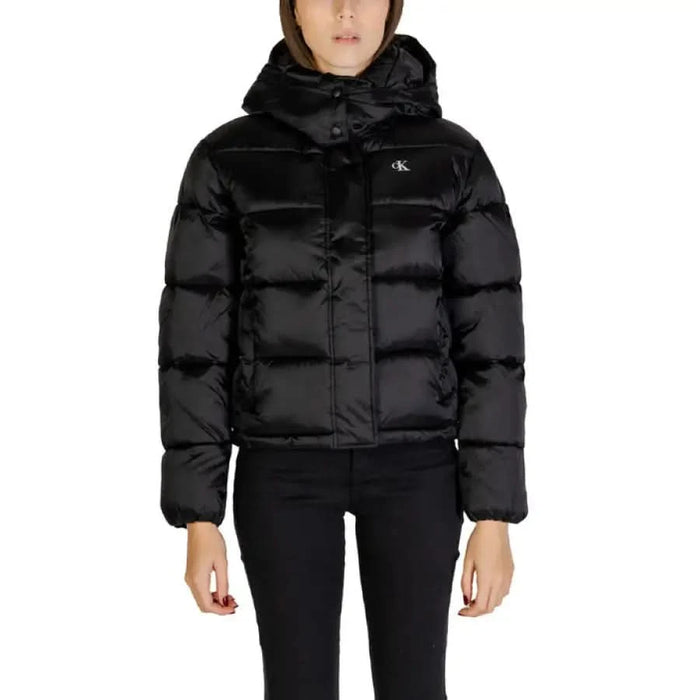 Black puffy winter jacket with hood and zipper by Calvin Klein Jeans for women