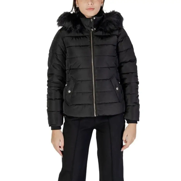 Black quilted puffer jacket with fur-trimmed hood and silver zipper from Only Women